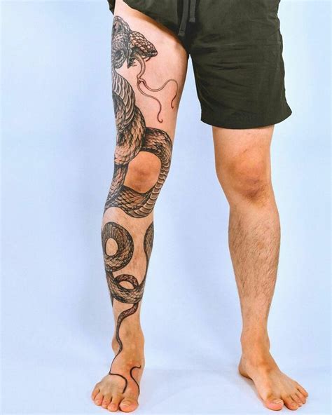 snake wrapped around leg tattoo meaning|14 Snake Tattoo Meanings + Serpent & Ouroboros。